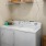 a washer and dryer in a closet