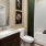 a bathroom with a tub sink and toilet