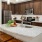 a kitchen with a marble counter top